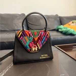 NICTEEL Black Leather mini Top-Handle Bag with Multicolor Embroidered Flap